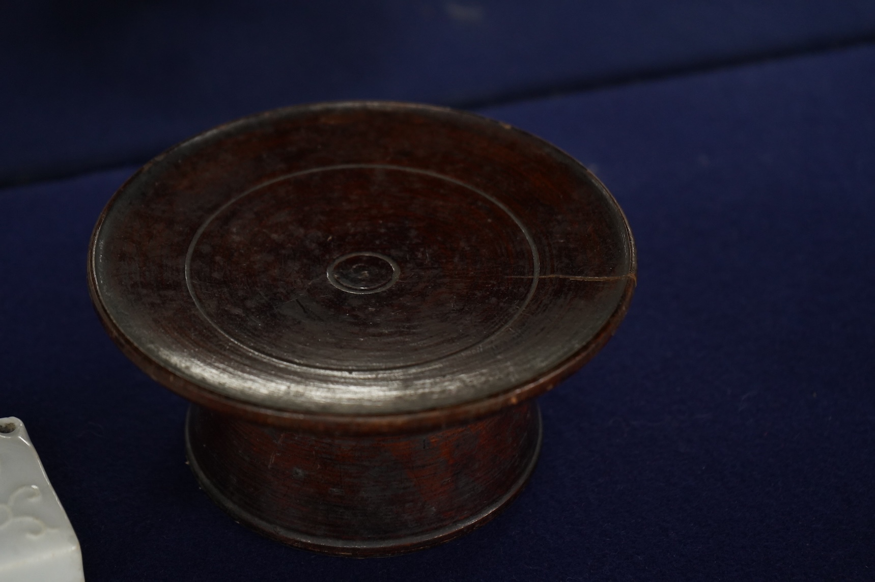 Two 19th century Korean ceramic water droppers and a Korean turned wood cup stand, oval water dropper 8cm long